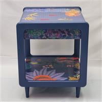 Kolibri im nächtlichen Beet